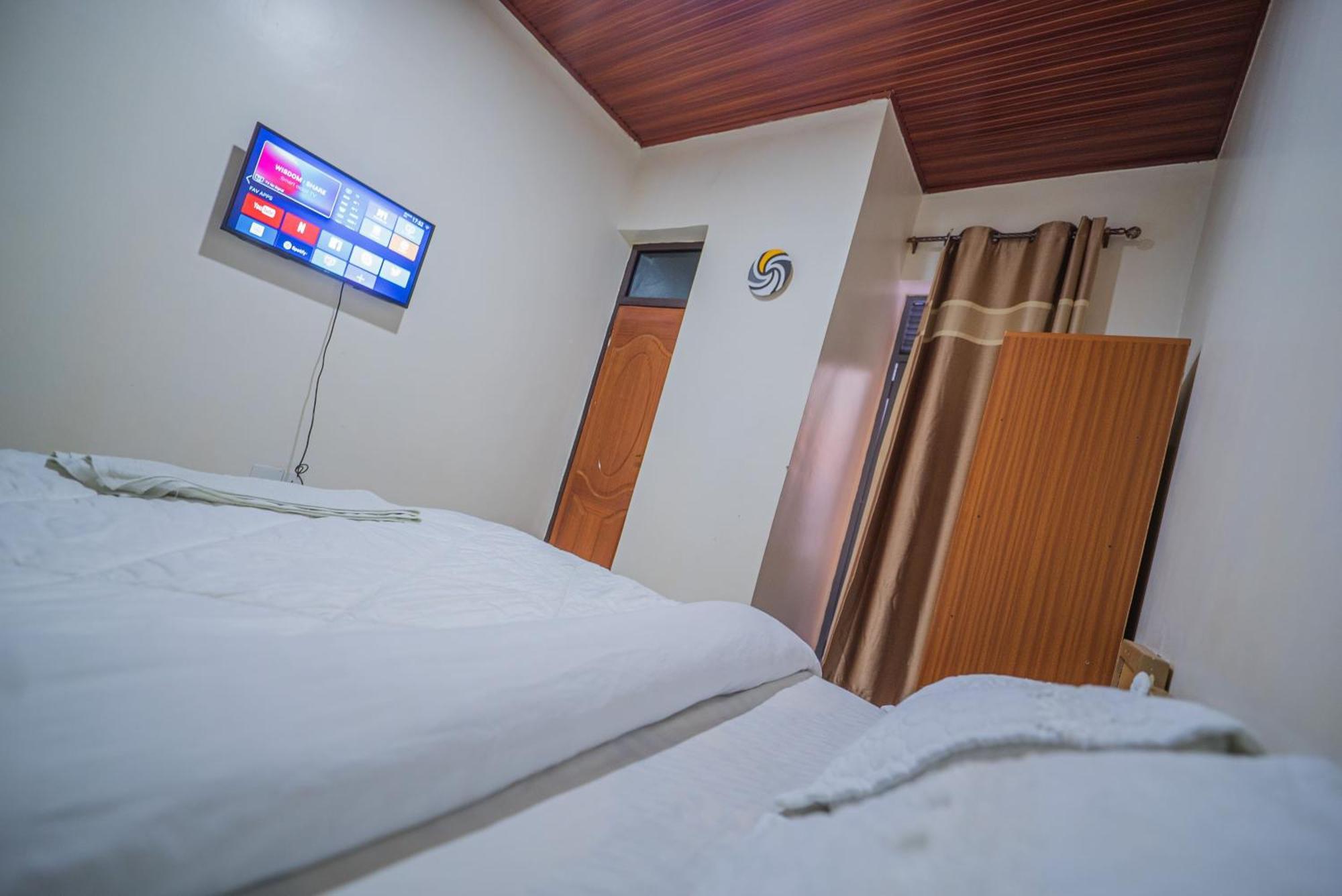 Anna Gold Hotel Kigali Bagian luar foto